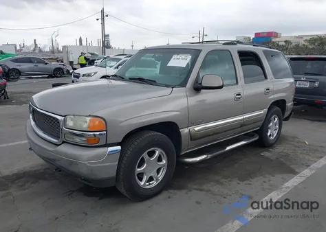 2001 GMC Yukon from USA, damaged, VIN 1GKEC13C21J240210